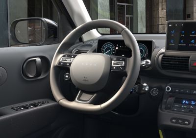 Closeup of the high-end steering wheel of the new Hyundai INSTER small electric car.
