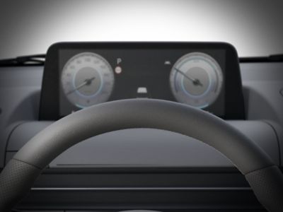 Het dashboard van de STARIA Premium met daarboven het digitale instrumentenpaneel.